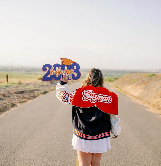 The Power of Personalization: Elevate Your Senior Photos with a Custom Graduation Sign