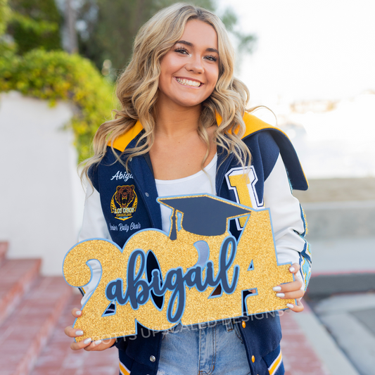 Graduation Sign personalized with senior graduate's name customized in school colors for senior portraits and grad party decor made by Potts Upscaled Designs LLC