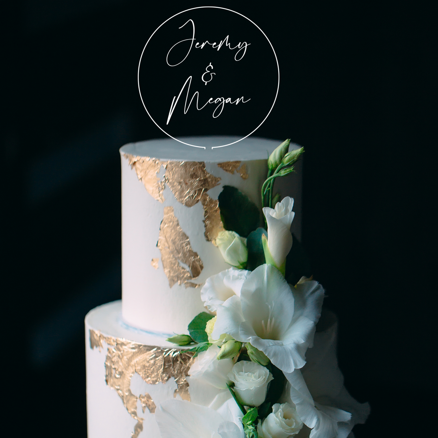 Wedding cake topper in clear acrylic engraved with the couples name by Potts Upscaled Designs LLC