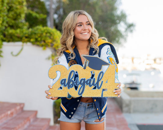 Graduation Sign personalized with graduate&#39;s name and school colors for senior portraits